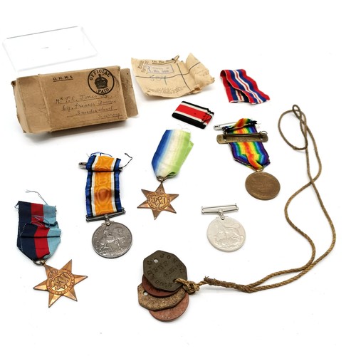 299 - WWI pair of medals (27682 SJT D C JONES R W FUS) + 'Service wounded stripe', dog / ID tags, WWII med... 