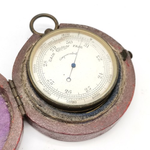 301 - Antique gilt metal cased pocket barometer in original leather fitted travel case (6.2cm diameter) ~ ... 