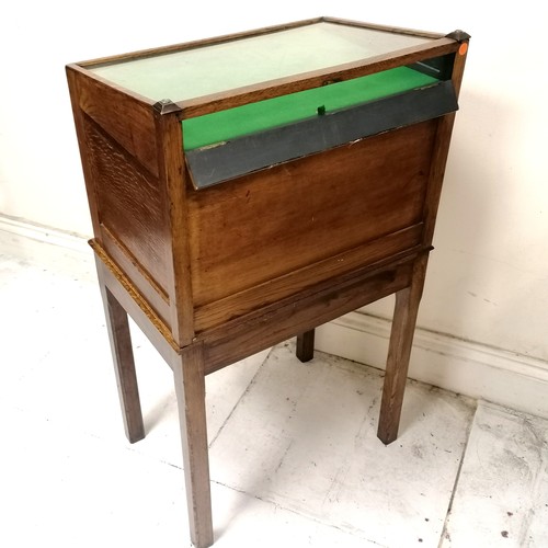 304 - Antique oak 5 drawer collectors cabinet with glazed sloping top with Art Nouveau brass handles on 4 ... 