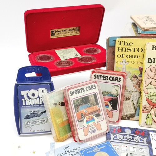 316 - Qty of coins (inc Guernsey £5's, cased sets, Ladybird books, Top Trumps etc