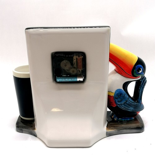 318 - Guinness Time porcelain clock with toucan & glass detail - 21cm high x 26cm and in running order at ... 