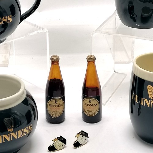 319 - Guinness Carlton ware 3 piece teaset with 2 mugs & 2 miniatures (8.5cm) & 2 badges