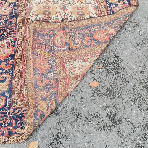 370 - Antique hand woven Persian rug with blue ground border & geometric pattern - 212cm x 142cm ~ slight ... 