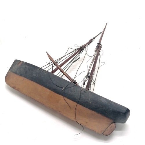 379 - Antique folk art model of a boat - 26cm long ~ mast / rigging needs attention