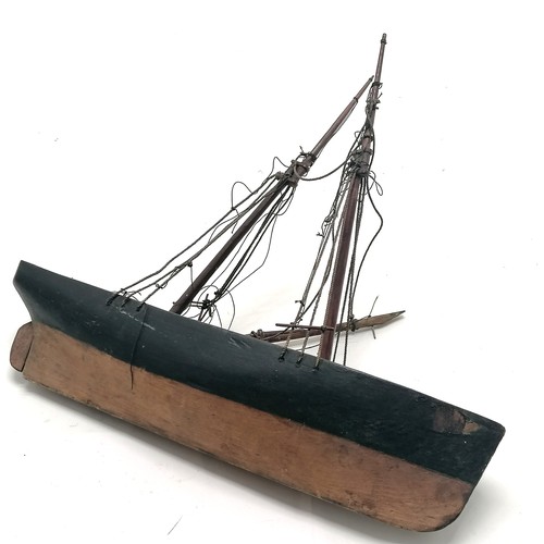 379 - Antique folk art model of a boat - 26cm long ~ mast / rigging needs attention