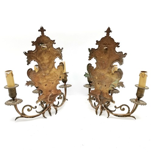 383 - Antique pair of brass 3 branch wall sconces with mask detail terminating with fleur de lis tops - 38... 