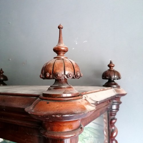 396 - Antique rosewood glazed cabinet with 2 drawers to the base and has 4 carved wooden finials (2 A/F)Th... 