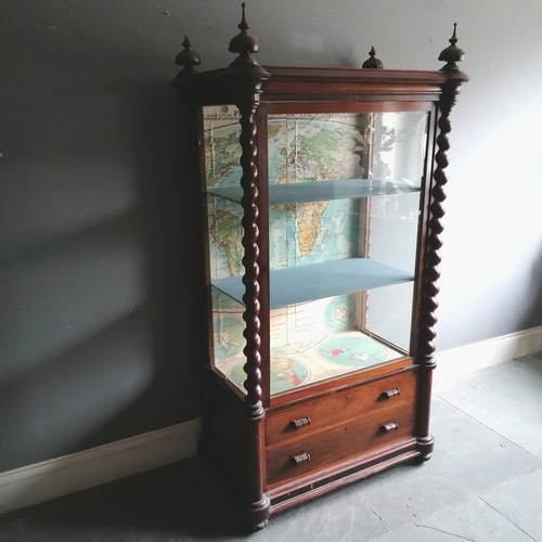 396 - Antique rosewood glazed cabinet with 2 drawers to the base and has 4 carved wooden finials (2 A/F)Th... 