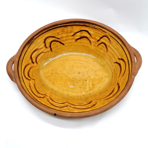 501 - Clive Bowen (b.1943) large studio pottery slipware bowl - 50cm x 40cm & no obvious damage