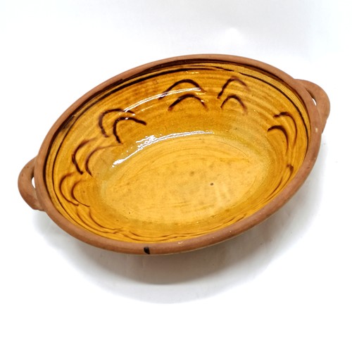 501 - Clive Bowen (b.1943) large studio pottery slipware bowl - 50cm x 40cm & no obvious damage