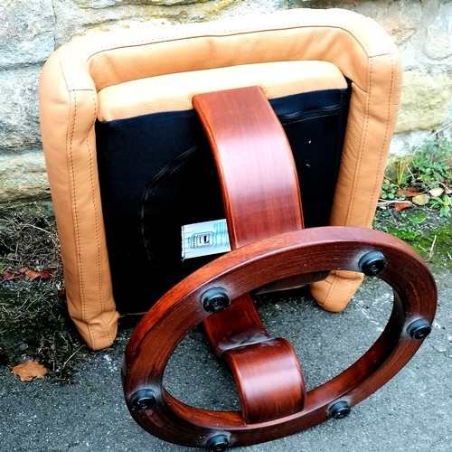 508 - Contemporary brown leather adjustable easy chair with attached side table and a matching leather sto... 