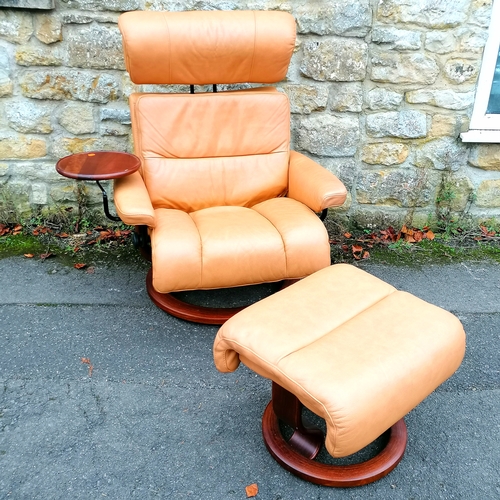 508 - Contemporary brown leather adjustable easy chair with attached side table and a matching leather sto... 