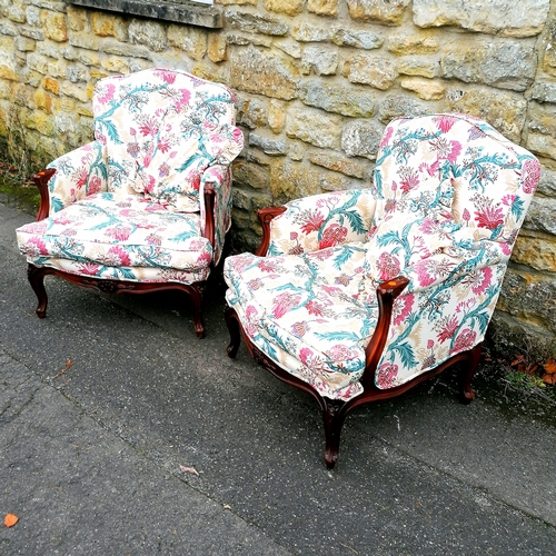 510 - Pair of floral upholstered continental armchairs with matching cushions - in good used condition