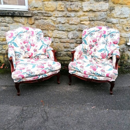 510 - Pair of floral upholstered continental armchairs with matching cushions - in good used condition