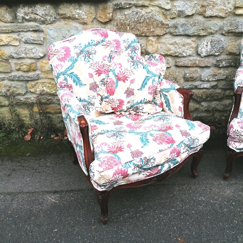 510 - Pair of floral upholstered continental armchairs with matching cushions - in good used condition