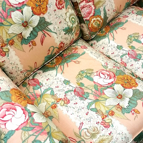 512 - Vintage 2 seater sofa upholstered in pink floral fabric - in good used condition - 144cm x 82cm x 78... 