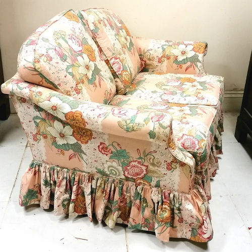 512 - Vintage 2 seater sofa upholstered in pink floral fabric - in good used condition - 144cm x 82cm x 78... 