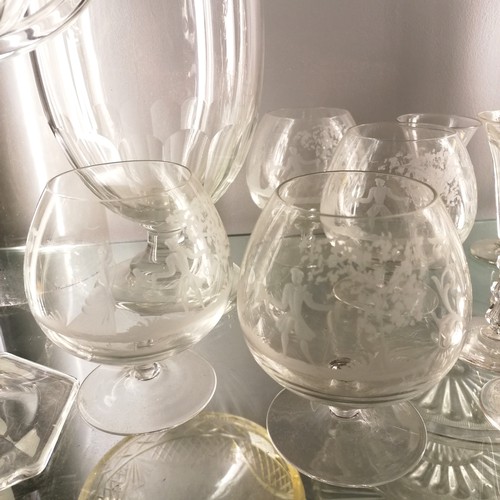 120A - Large quantity of mostly antique glassware including cake stands, 4 acid etched with courting couple... 