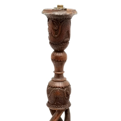 11 - Chinese hand carved wooden lamp base with dragon detail 52cm high - has a crack to the base T/W a me... 