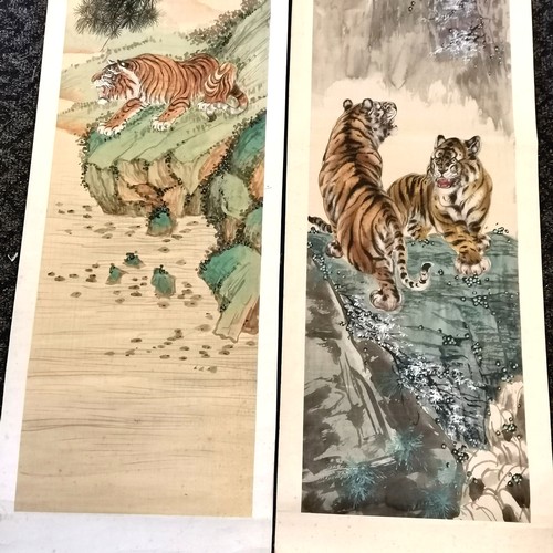 14 - 2 Oriental hand painted scrolls depicting tigers 136cm x 35cm -has some foxing