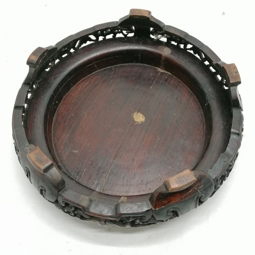 16 - Oriental antique hardwood circular stand 23cm diameter x 9cm high - has repair to one foot