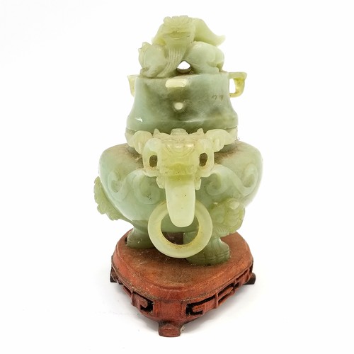 28 - Chinese carved jade / hardstone tripod censer / koro with dragon detail on a wooden base - 17.5cm ac... 