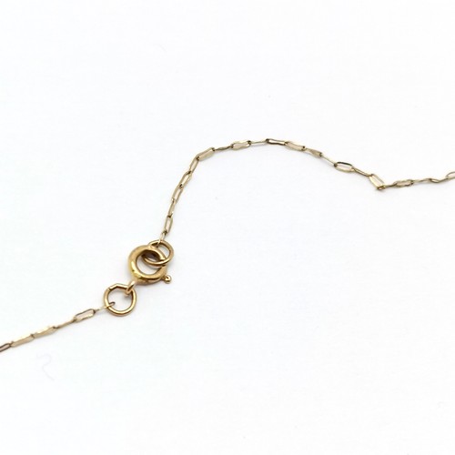 268 - 9ct gold marked fine chain 42cm long 0.36g