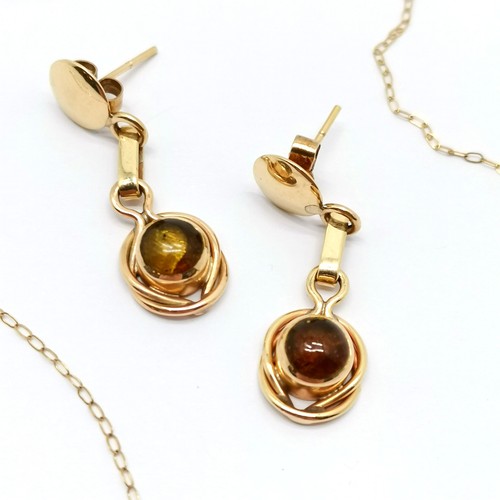 271 - Pair of 14ct gold marked drop earrings set with amber 2.8cm drop total weight 4.6g