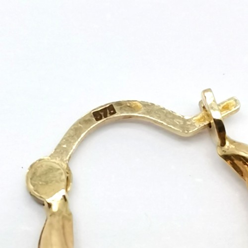 273 - 3 pairs of 9ct gold marked half hoop earrings largest 1.4cm diameter 1.9g total weight