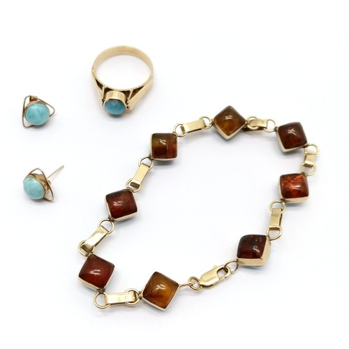 277 - 14ct gold marked bracelet 40cm long  and metamorphic ring (size Q) set with amber and blue stone tog... 