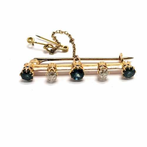 309 - Antique unmarked (touch tests as 15ct) gold diamond & sapphire bar brooch - 4cm long & 3.6g total we... 