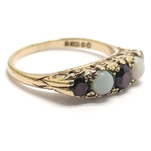 311 - 9ct hallmarked gold garnet / opal stone set ring - size M½ & 2.7g total weight