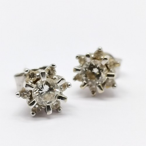 345 - 18ct hallmarked white gold pair of diamond cluster stud earrings - 2g total weight