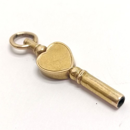 357 - Antique unmarked gold pocket watch key winder with heart shaped detail - 3cm & 1.3g total weight (sl... 