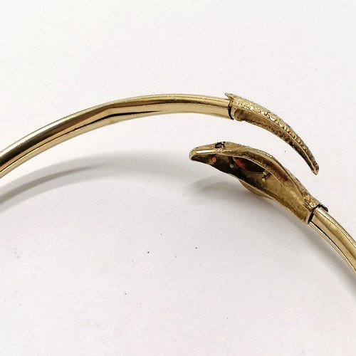 370 - 9ct hallmarked gold cobra snake bangle with red stone set detail - 6.3g total weight ~ slight distor... 