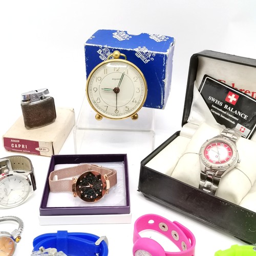 441 - Quantity of quartz wristwatches including boxed Farenheit T/W  a Ronson lighter and an alarm clock -... 