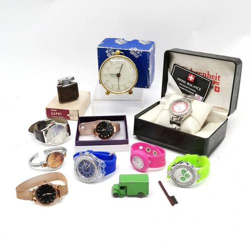 441 - Quantity of quartz wristwatches including boxed Farenheit T/W  a Ronson lighter and an alarm clock -... 