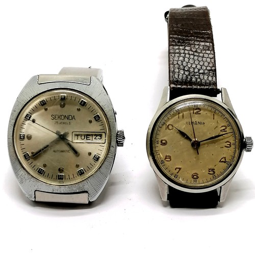 451 - Lemania stainless steel manual wind wristwatch (32mm case) on a leather strap - not running at time ... 