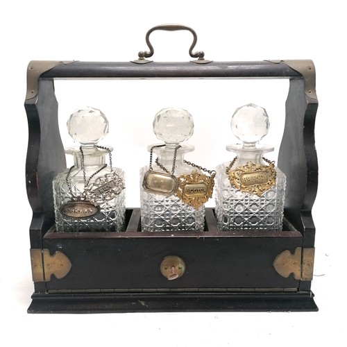 67 - Vintage tantalus with brass handle & fittings holding 3 x hobnail cut decanters - has key and has 5 ... 