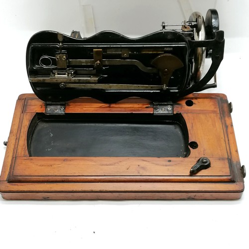 74 - Antique Singer sewing machine in original wooden case - 35cm x 25cm x 27cm high ~ mechanism moves bu... 