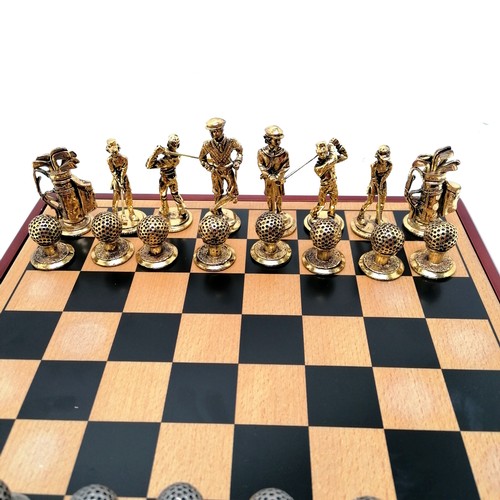 102 - Novelty boxed golfing chess set with cast metal pieces box 28cm x 28cm x 5.5cm high - in good used c... 