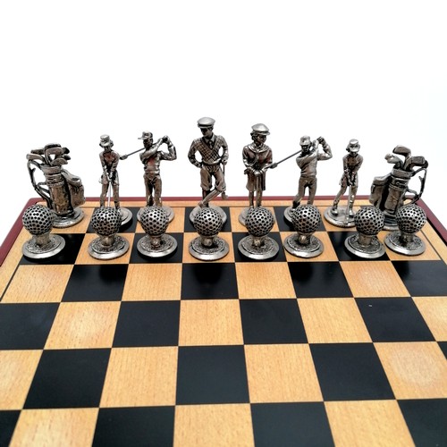 102 - Novelty boxed golfing chess set with cast metal pieces box 28cm x 28cm x 5.5cm high - in good used c... 