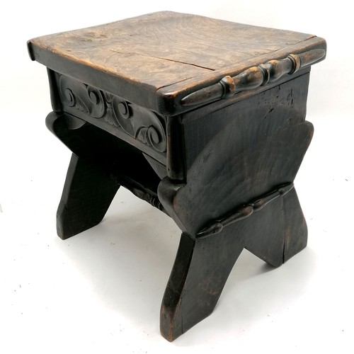 115 - Antique elm topped stool with hand carved detail - 40cm high x 41cm x 29cm