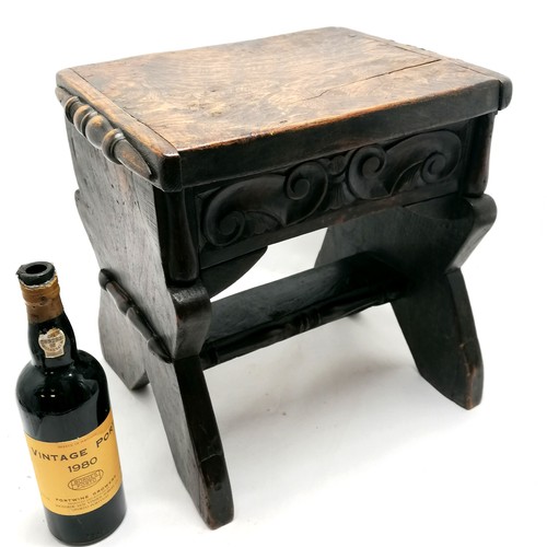 115 - Antique elm topped stool with hand carved detail - 40cm high x 41cm x 29cm