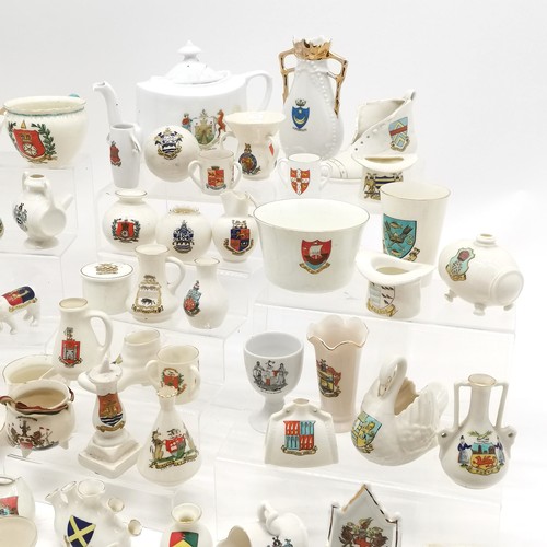 144 - Large collection of antique crested ware including Goss, Shelley, Willow Art China, Arcadian etc. no... 