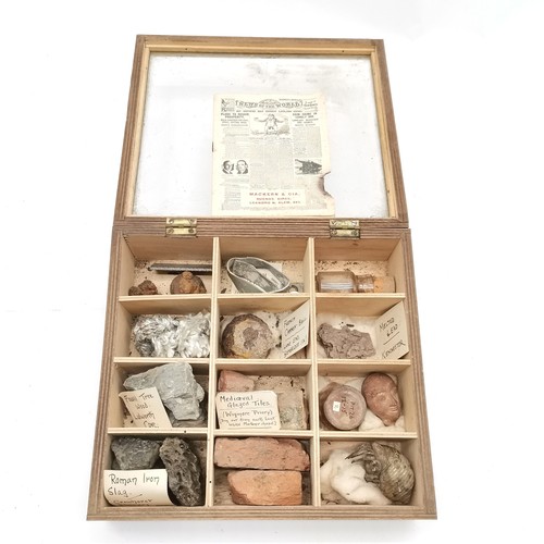 157 - Collectors cabinet containing curios with annotations including WWII German parachute cord, Antique ... 