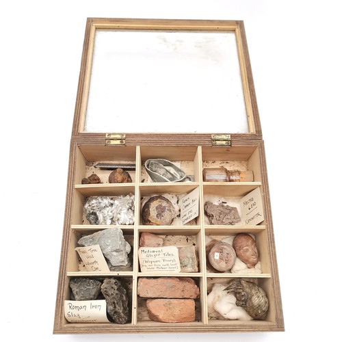 157 - Collectors cabinet containing curios with annotations including WWII German parachute cord, Antique ... 