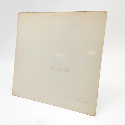 165 - The Beatles 'White album' hand signed with signatures inside ~ was signed in 1968 for a friend's fat... 