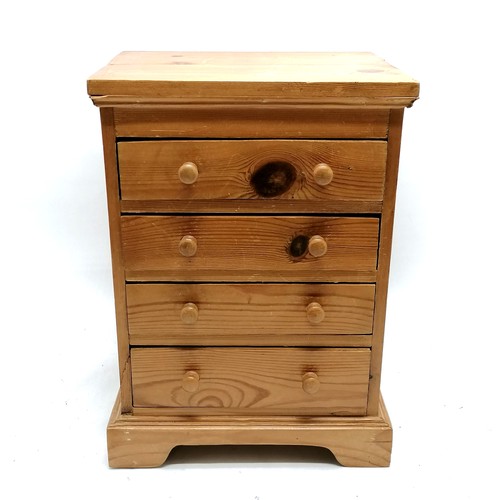 179 - Pine collectors cabinet with 4 drawers - 41.5cm high x 30cm across x 24.5cm depth