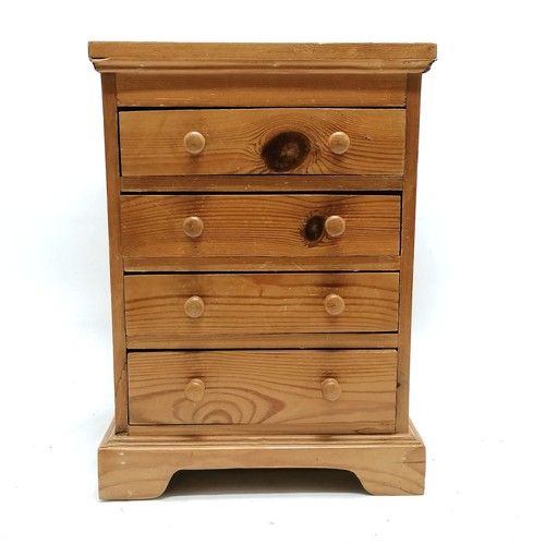 179 - Pine collectors cabinet with 4 drawers - 41.5cm high x 30cm across x 24.5cm depth